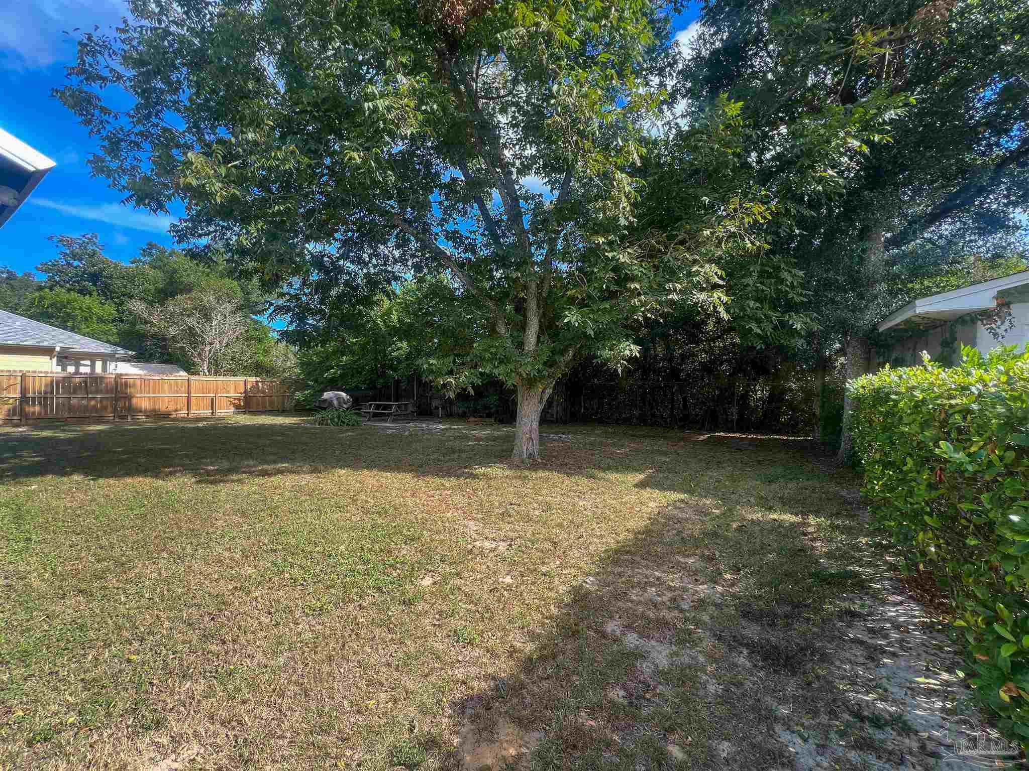1315 Dexter Avenue Pensacola, FL 32507 - Photo 3 of 22 a view of backyard with green space