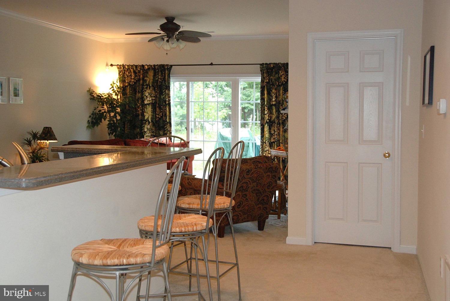 708 Ruxton Road, Unit 69 Solomons, MD 20629 - Photo 15 of 88 Looking across Kitchen counter to LR, & Bedrm door