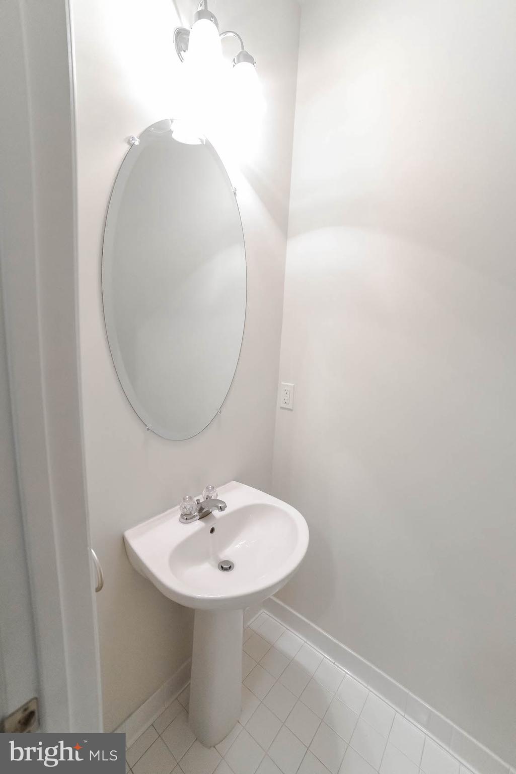 708 Ruxton Road, Unit 69 Solomons, MD 20629 - Photo 25 of 88 The Powder Room is next to the Kitchen.