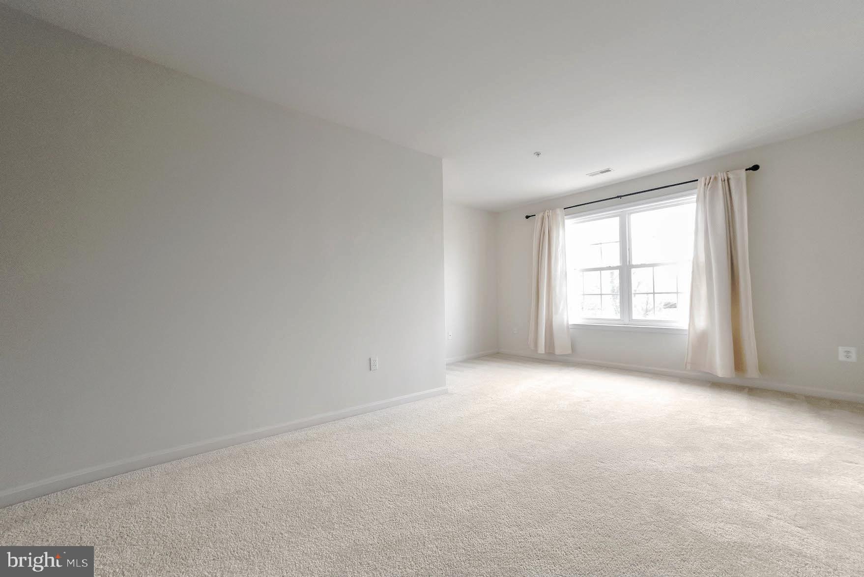 708 Ruxton Road, Unit 69 Solomons, MD 20629 - Photo 39 of 88 Front Bedroom over garage is very spacious.