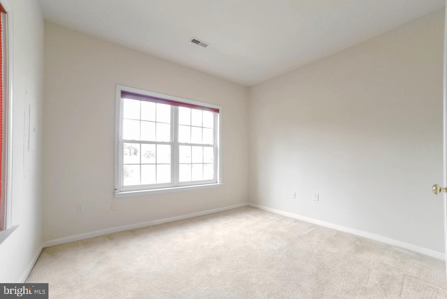 708 Ruxton Road, Unit 69 Solomons, MD 20629 - Photo 10 of 88 Front room could be an office, DR, or 5th Bedroom