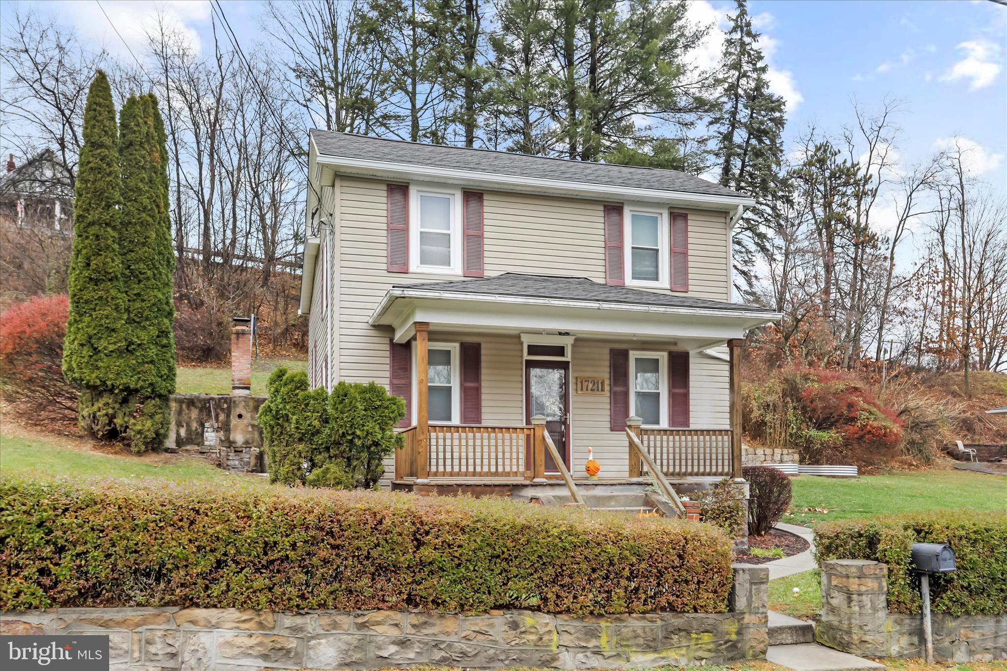 17211 Porter Road Southwest Frostburg, MD 21532 - Photo 2 of 34 a front view of a house with garden