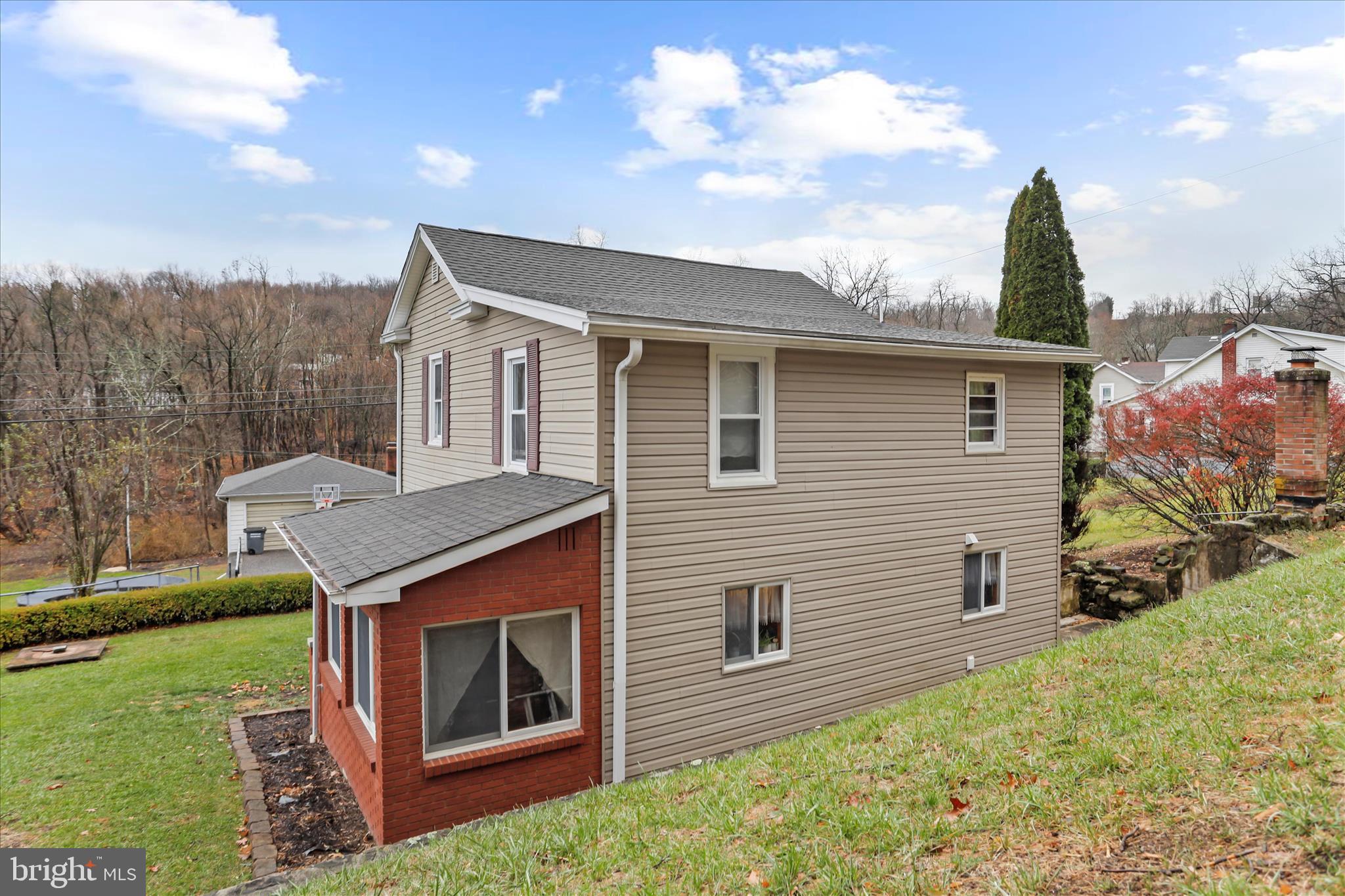 17211 Porter Road Southwest Frostburg, MD 21532 - Photo 26 of 34 a front view of a house with garden
