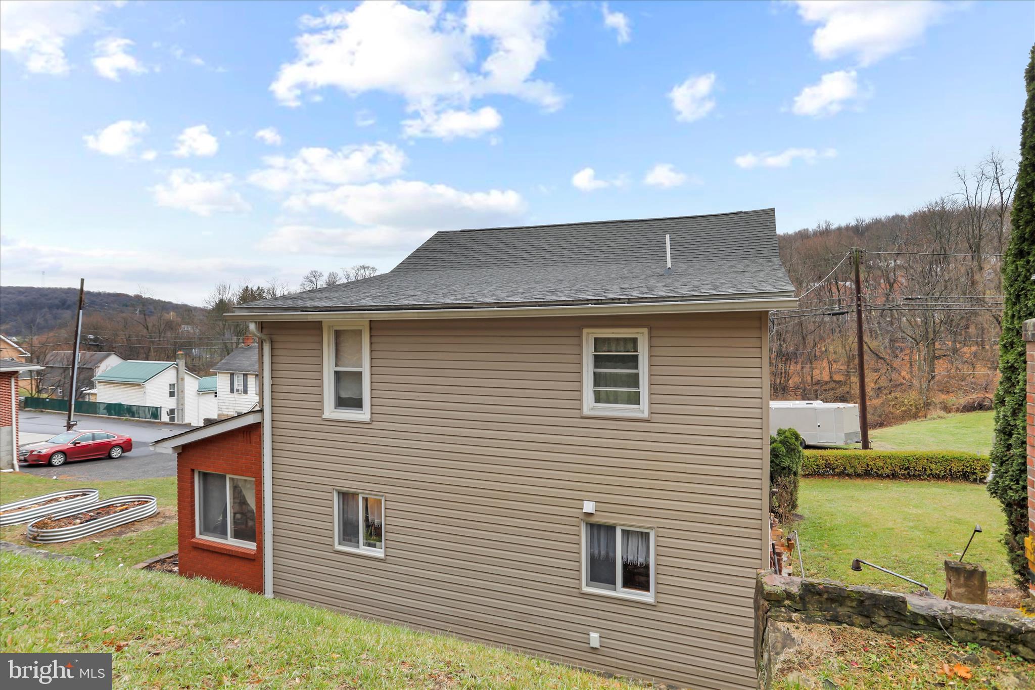 17211 Porter Road Southwest Frostburg, MD 21532 - Photo 27 of 34 a front view of a house with a yard