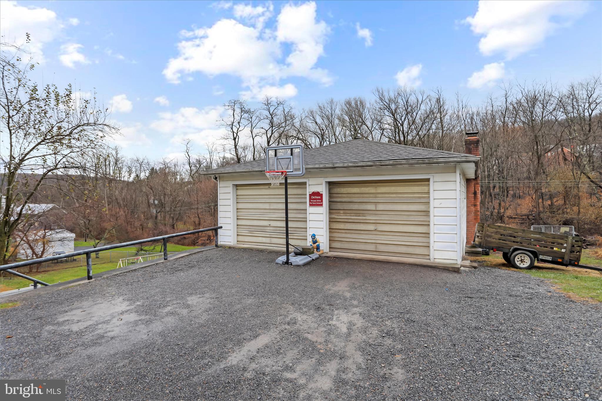 17211 Porter Road Southwest Frostburg, MD 21532 - Photo 29 of 34 a view of a house with a yard and wooden fence