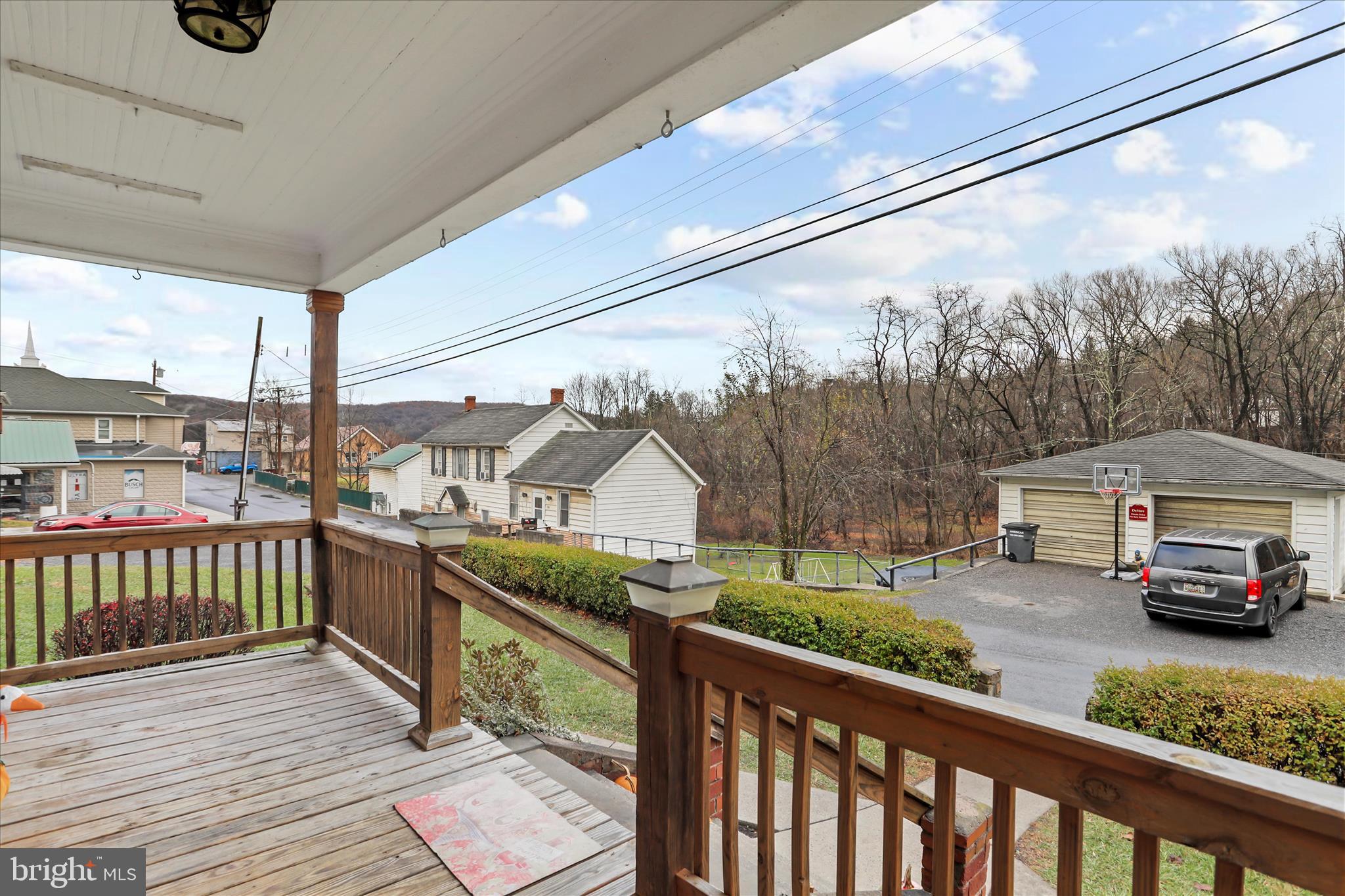 17211 Porter Road Southwest Frostburg, MD 21532 - Photo 7 of 34 a car parked on the side of a street