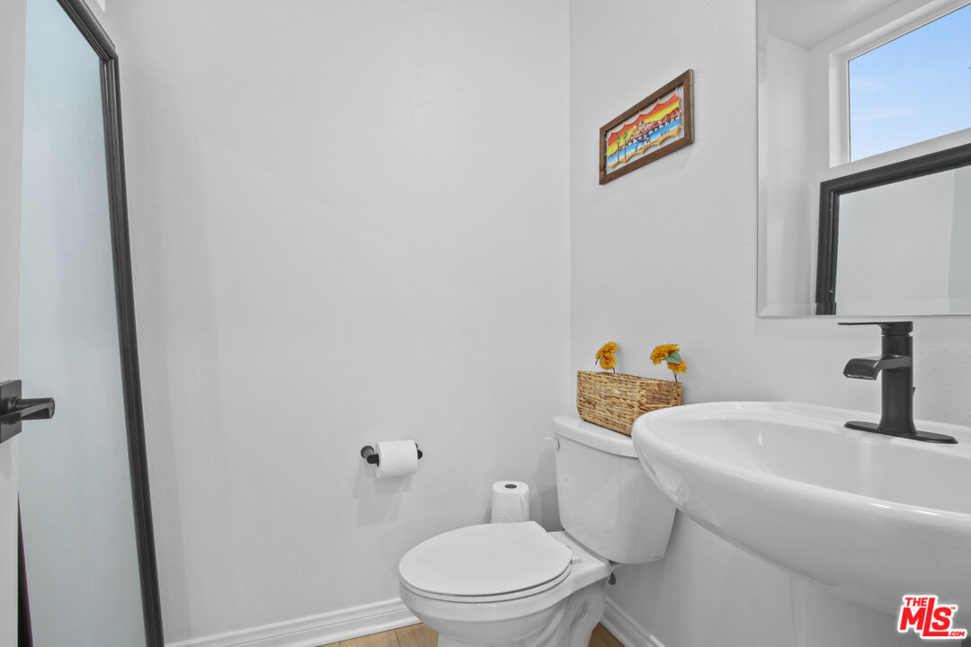 764 Daniel Freeman Circle Inglewood, CA 90301 - Photo 23 of 35 a white toilet sitting next to a white sink