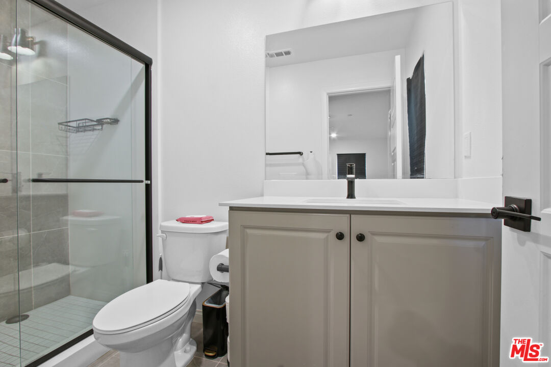 764 Daniel Freeman Circle Inglewood, CA 90301 - Photo 27 of 35 a bathroom with a toilet sink and shower