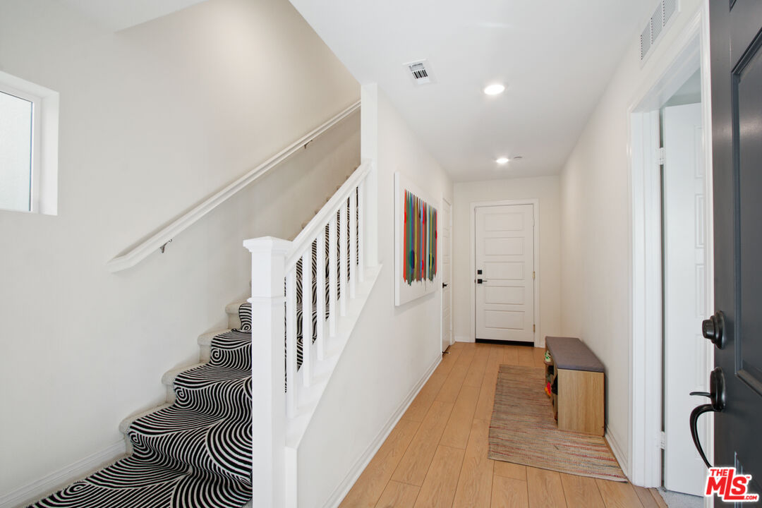 764 Daniel Freeman Circle Inglewood, CA 90301 - Photo 5 of 35 a view of entryway and hall with wooden floor
