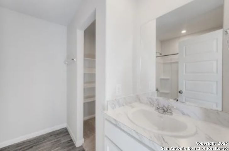 617 Cadena Loop Kenedy, TX 78119 - Photo 13 of 21 a bathroom with a sink and a mirror