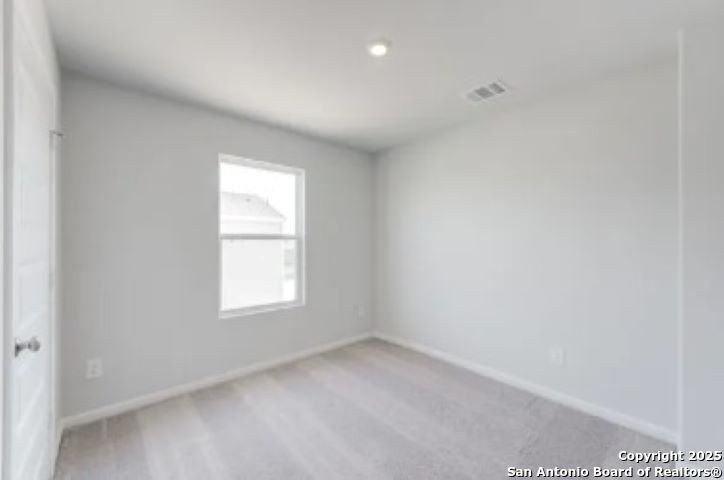 617 Cadena Loop Kenedy, TX 78119 - Photo 5 of 21 an empty room with window
