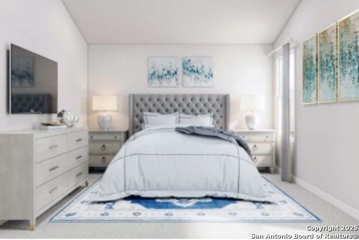 617 Cadena Loop Kenedy, TX 78119 - Photo 8 of 21 a bedroom with a bed and a flat screen tv