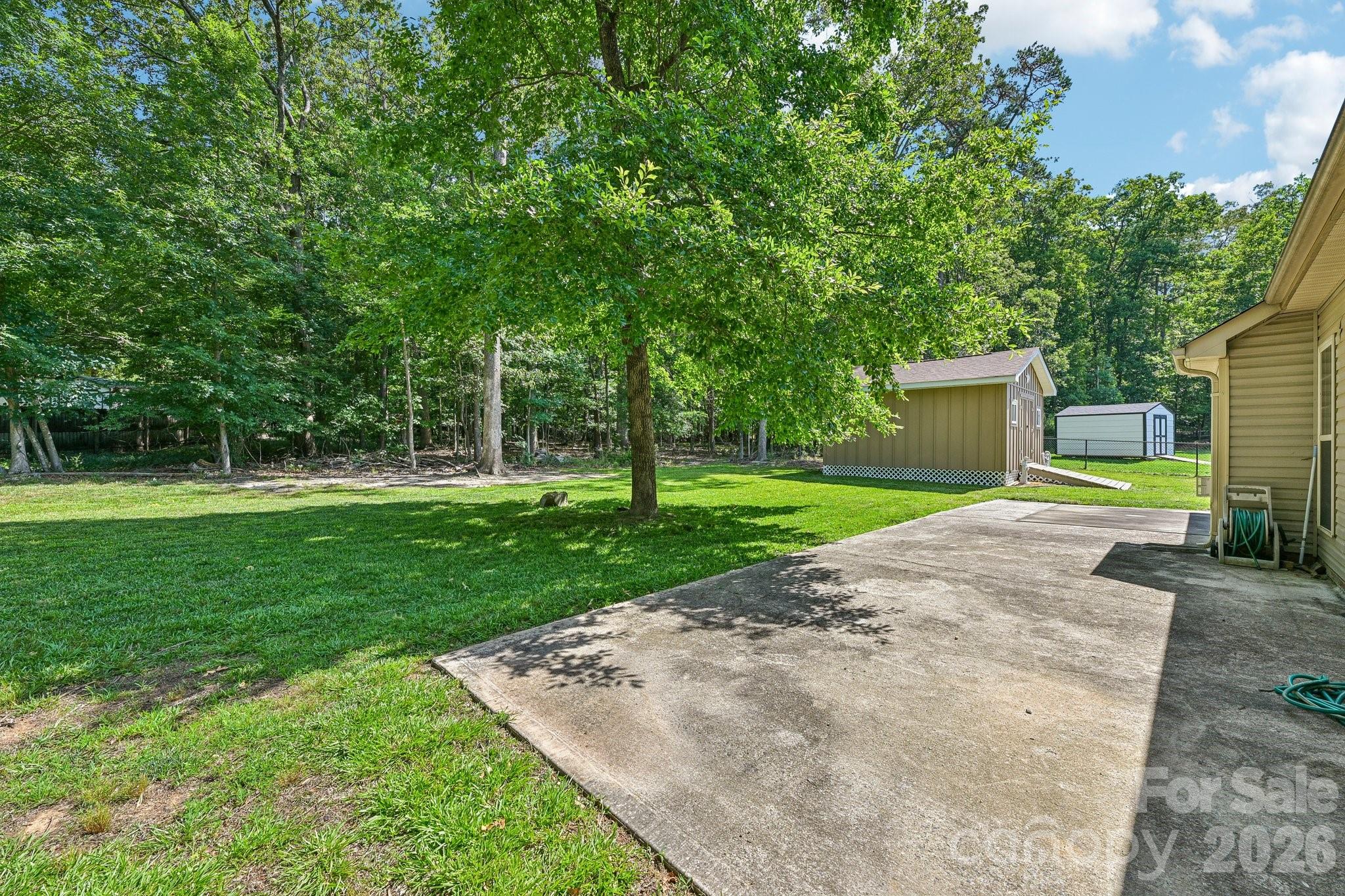 624 Hunley Street Monroe, NC 28112 - Photo 28 of 36 a view of a house with a yard