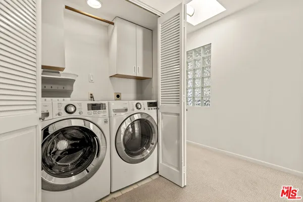 a bathroom with a shower and toilet