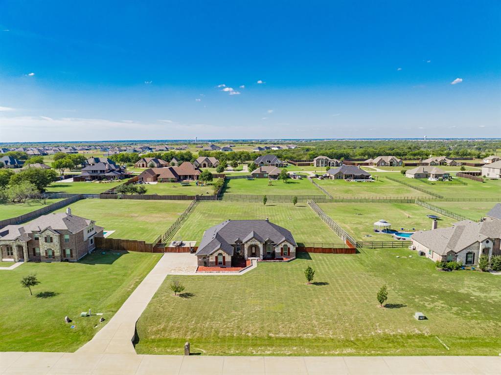 14176 Paterson Road Talty, TX 75126 - Photo 38 of 40 a view of a swimming pool and a yard
