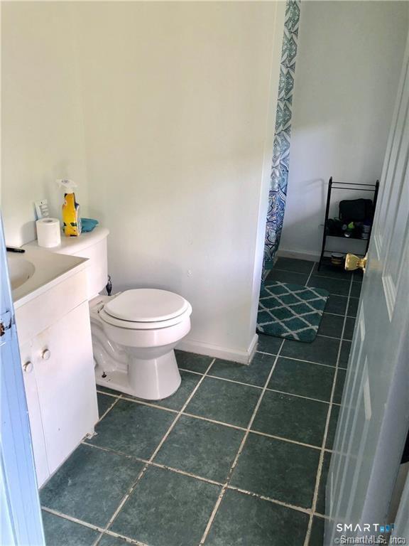 110 Beaver Street Ansonia, CT 06401 - Photo 21 of 31 a bathroom with a toilet and a shower