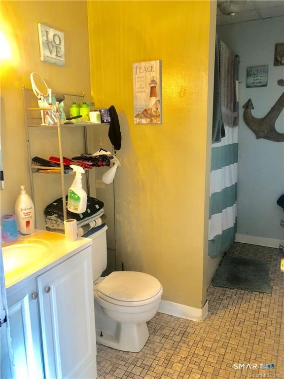110 Beaver Street Ansonia, CT 06401 - Photo 28 of 31 a bathroom with a sink and a toilet