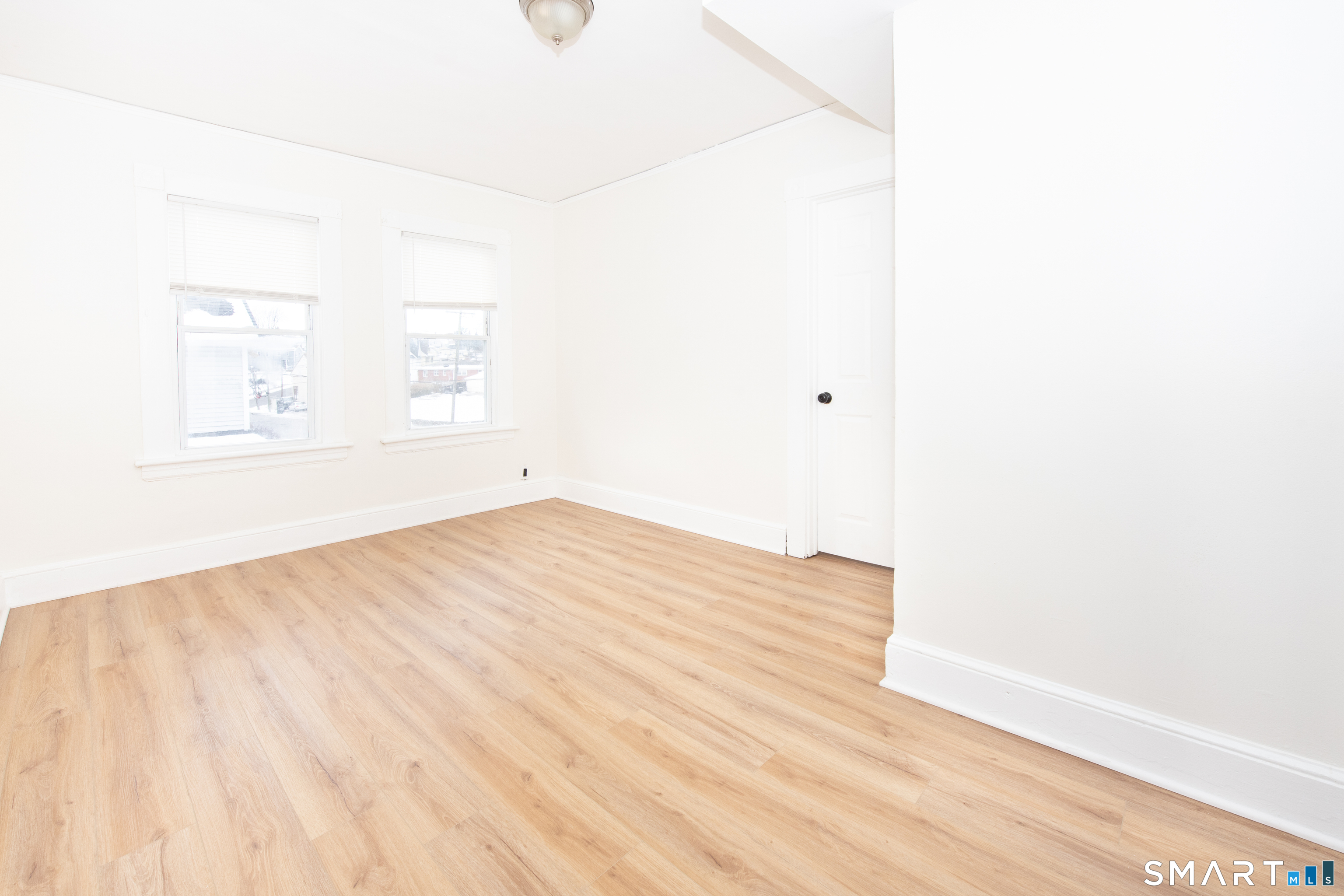 110 Beaver Street Ansonia, CT 06401 - Photo 6 of 31 a view of empty room with wooden floor