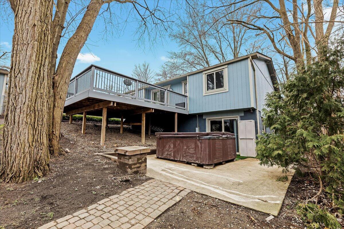 2894 Benstein Road Walled Lake, MI 48390 - Photo 5 of 33 WALK OUT AND HOT TUB,PATIO