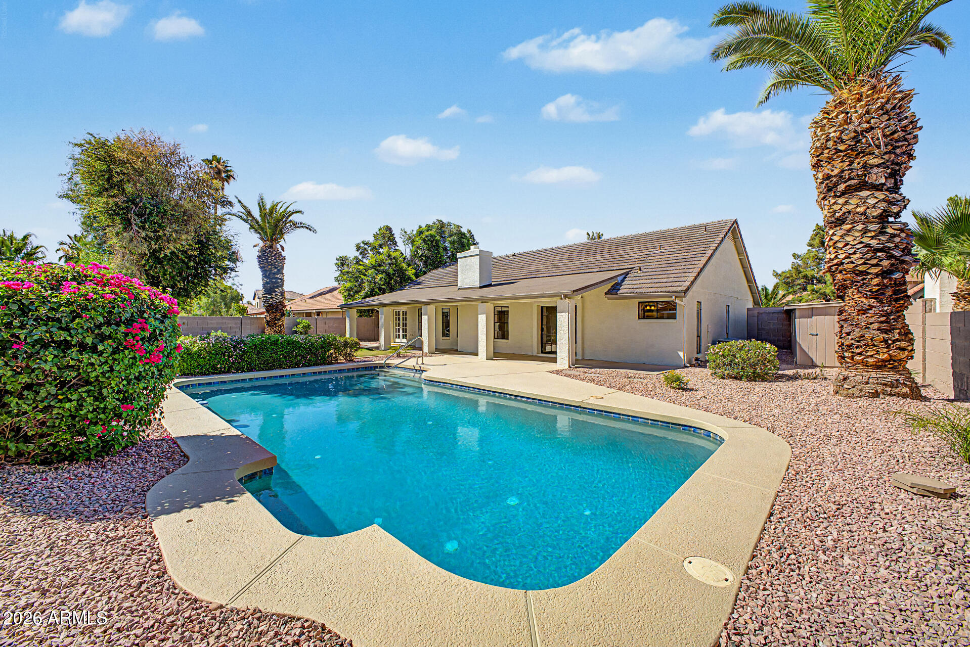 6725 West Utopia Road Glendale, AZ 85308 - Photo 25 of 27 a view of a house with swimming pool