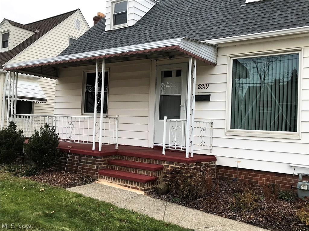 8219 Snow Road Parma, OH 44129 - Photo 2 of 22 Relax on this beautiful large porch.
