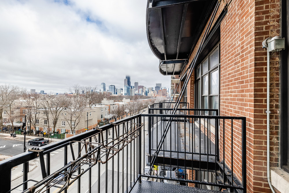 1503 South State Street, Unit 403 Chicago, IL 60605 - Photo 15 of 20 a view of city from a balcony