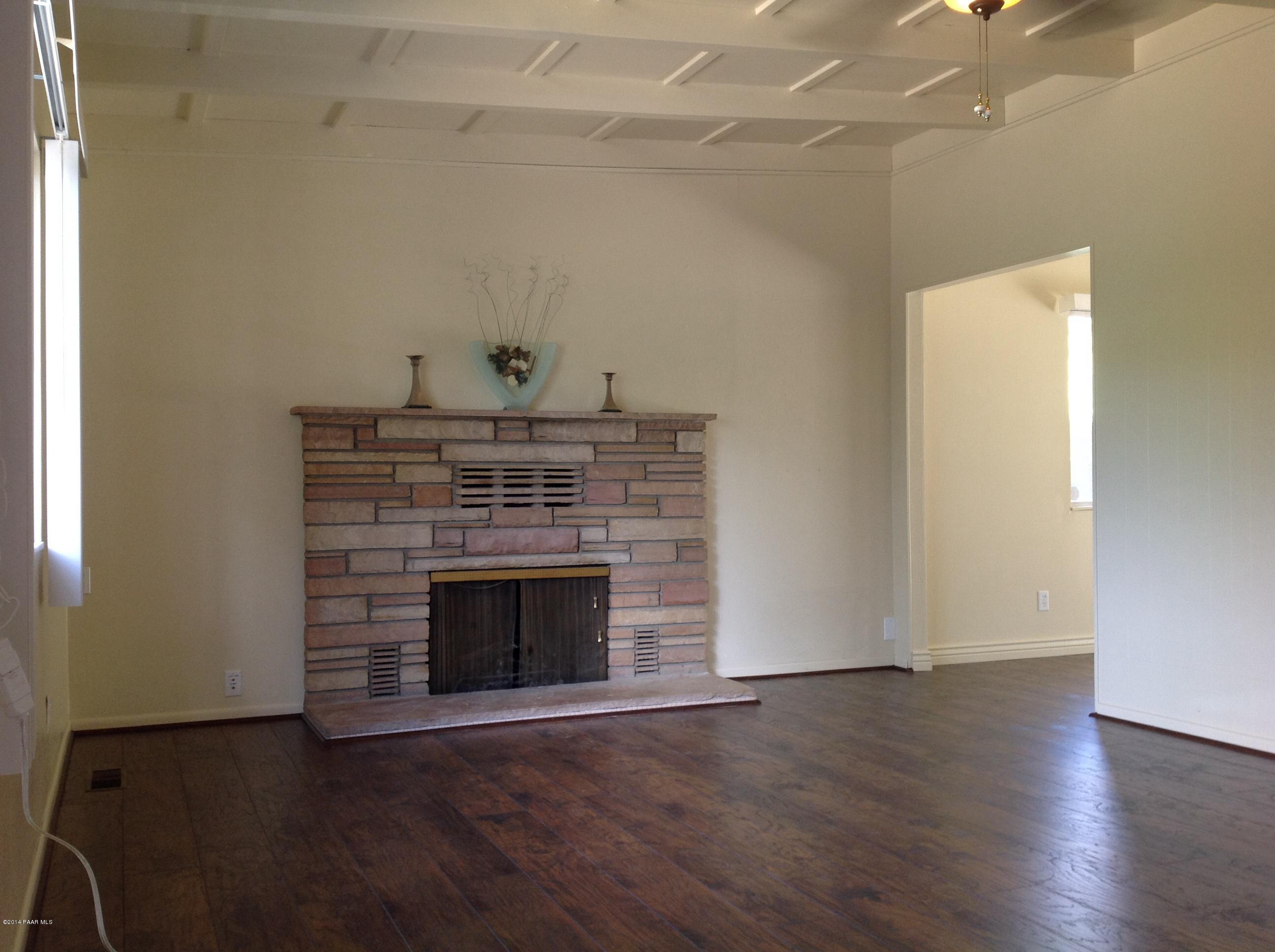 1105 Middlebrook Road Prescott, AZ 86303 - Photo 6 of 30 Cozy family room w/ fireplace