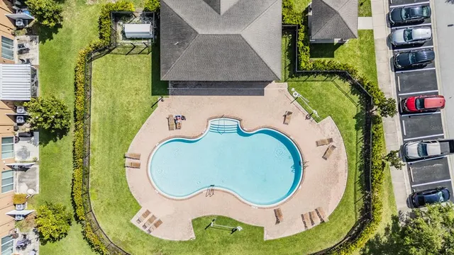 an aerial view of a swimming pool