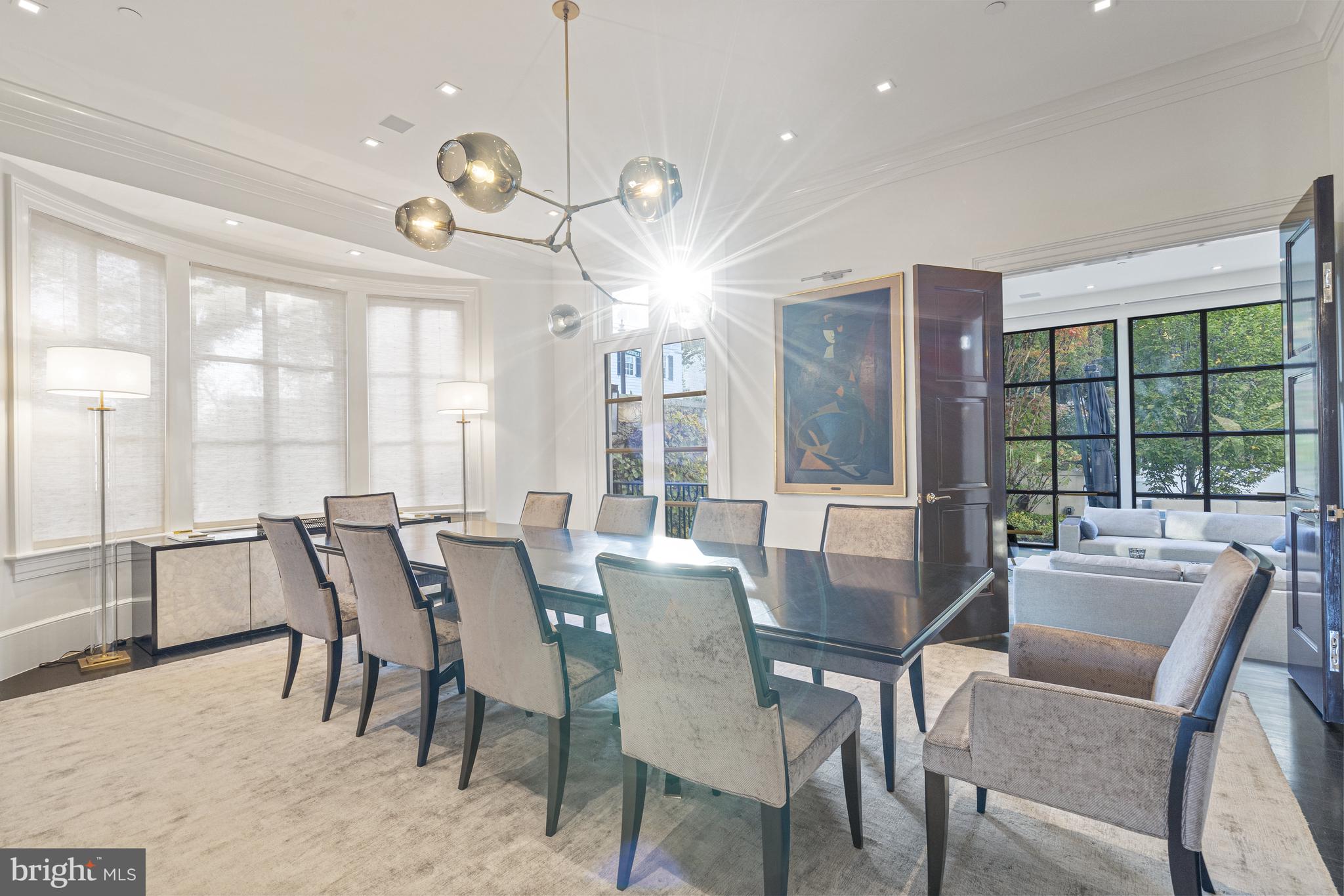 2109 Dunmore Lane Washington, DC 20007 - Photo 13 of 92 a view of a dining room with furniture a chandelier and wooden floor