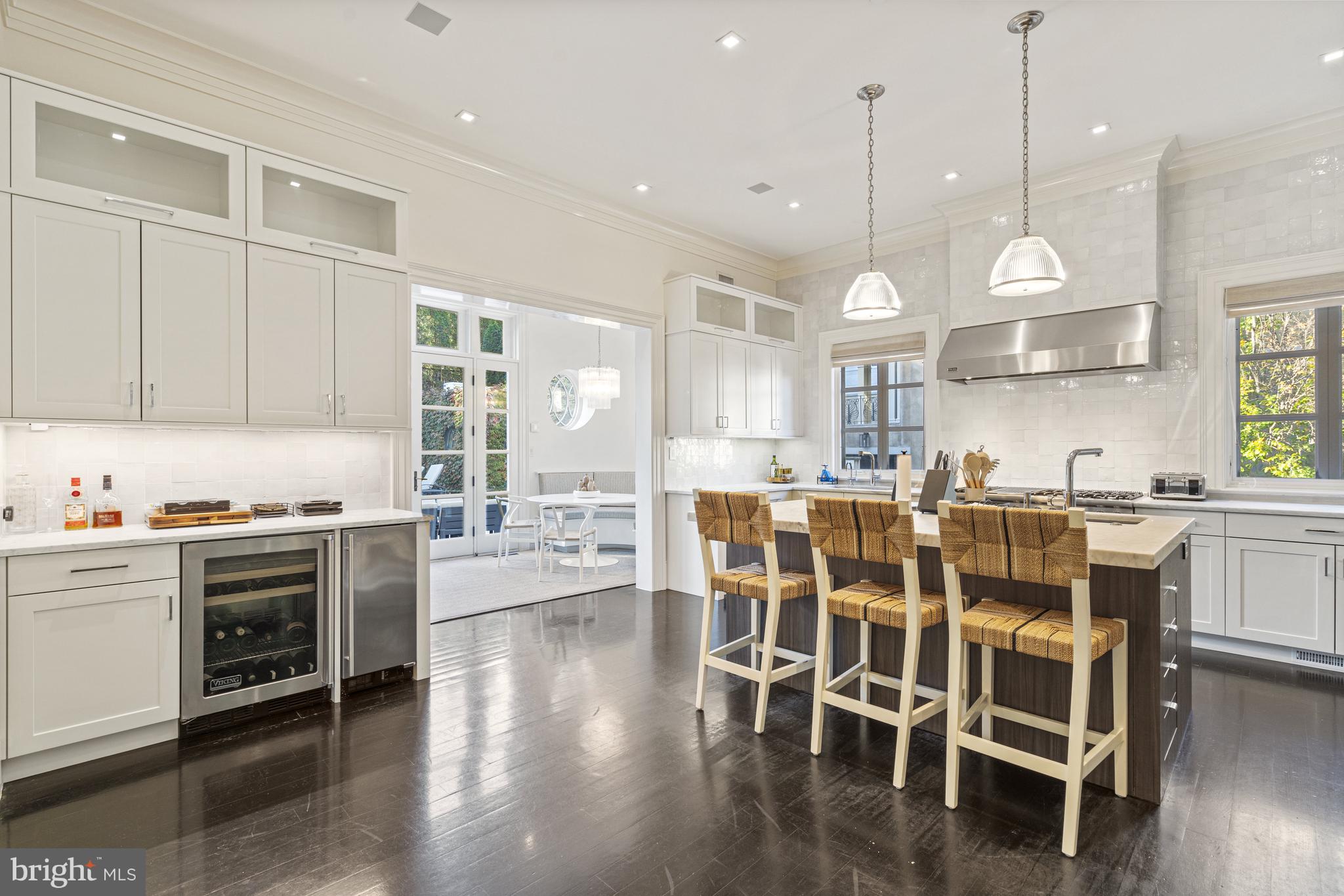 2109 Dunmore Lane Washington, DC 20007 - Photo 23 of 92 a large kitchen with a table and chairs