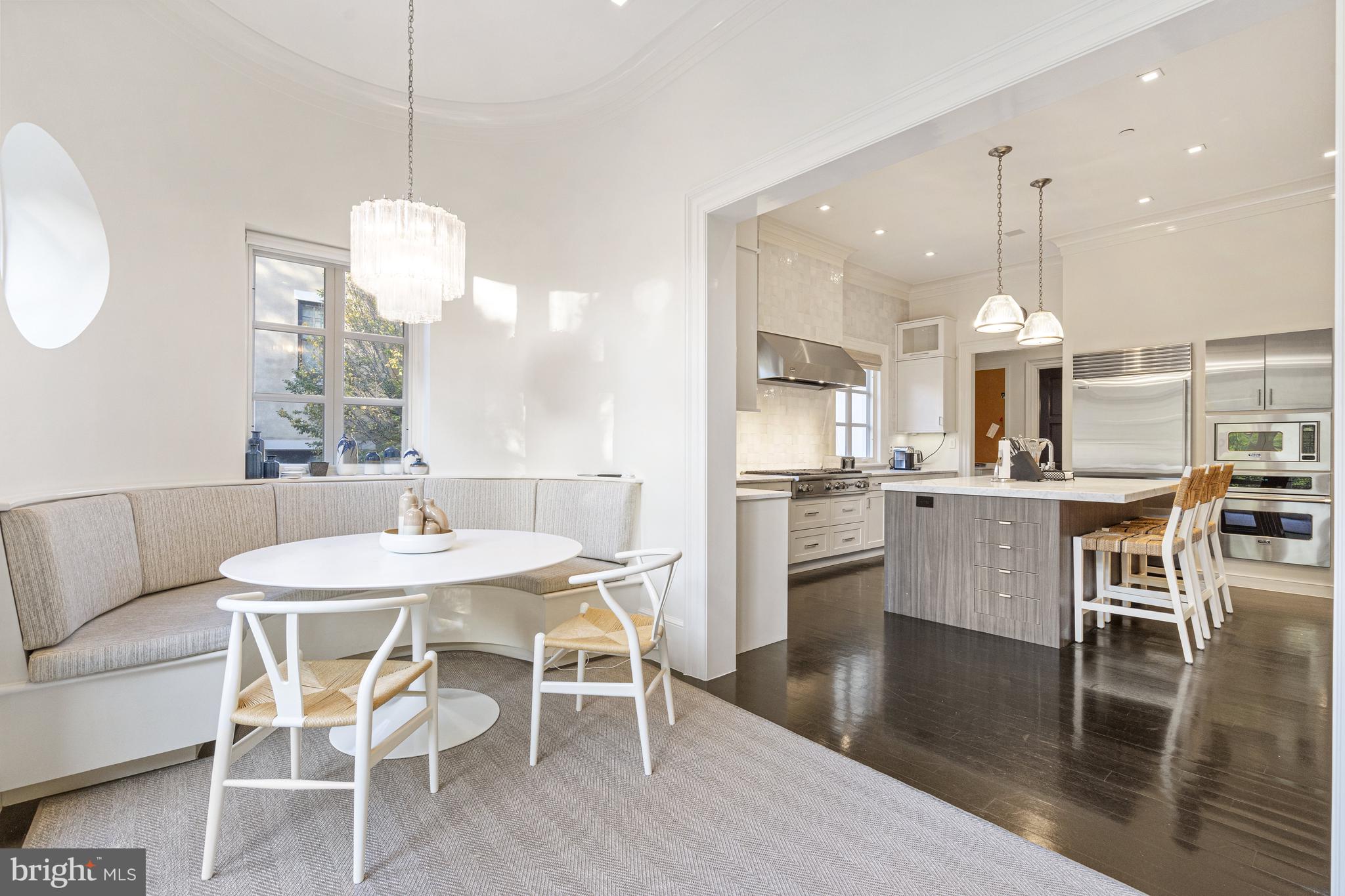 2109 Dunmore Lane Washington, DC 20007 - Photo 24 of 92 a view of a dining room with furniture wooden floor and chandelier