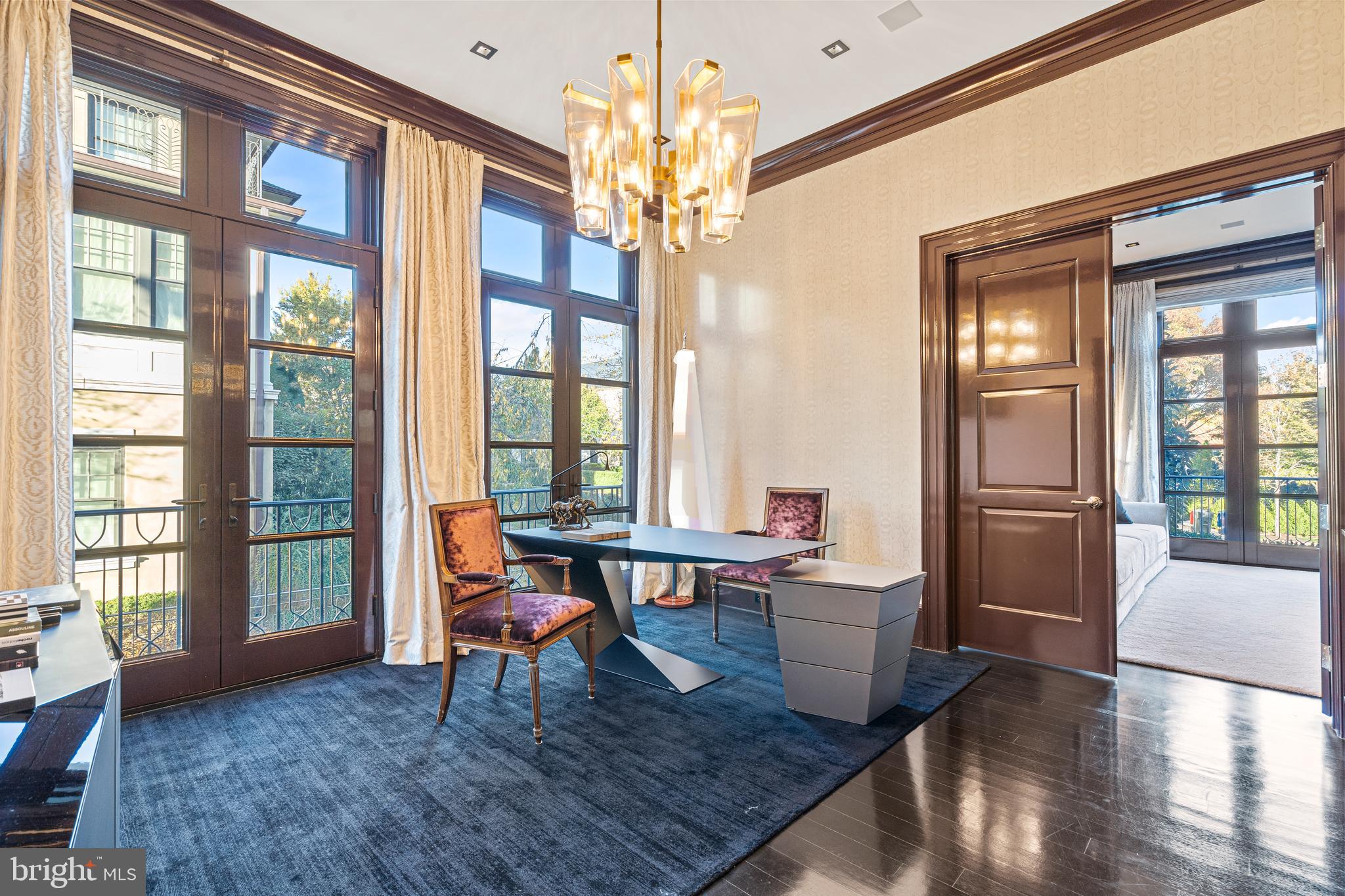 2109 Dunmore Lane Washington, DC 20007 - Photo 28 of 92 a view of a livingroom with furniture wooden floor and a chandelier