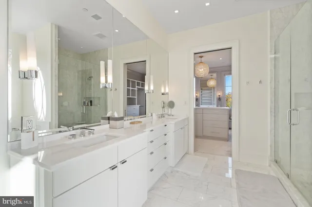 a living room with furniture and a mirror