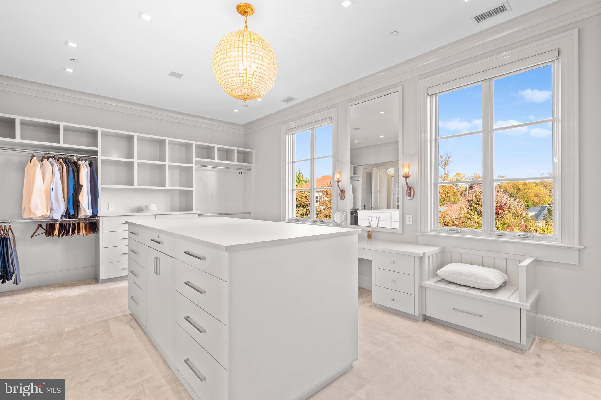 2109 Dunmore Lane Washington, DC 20007 - Photo 46 of 92 a spacious bathroom with a granite countertop sink a large mirror and a shower