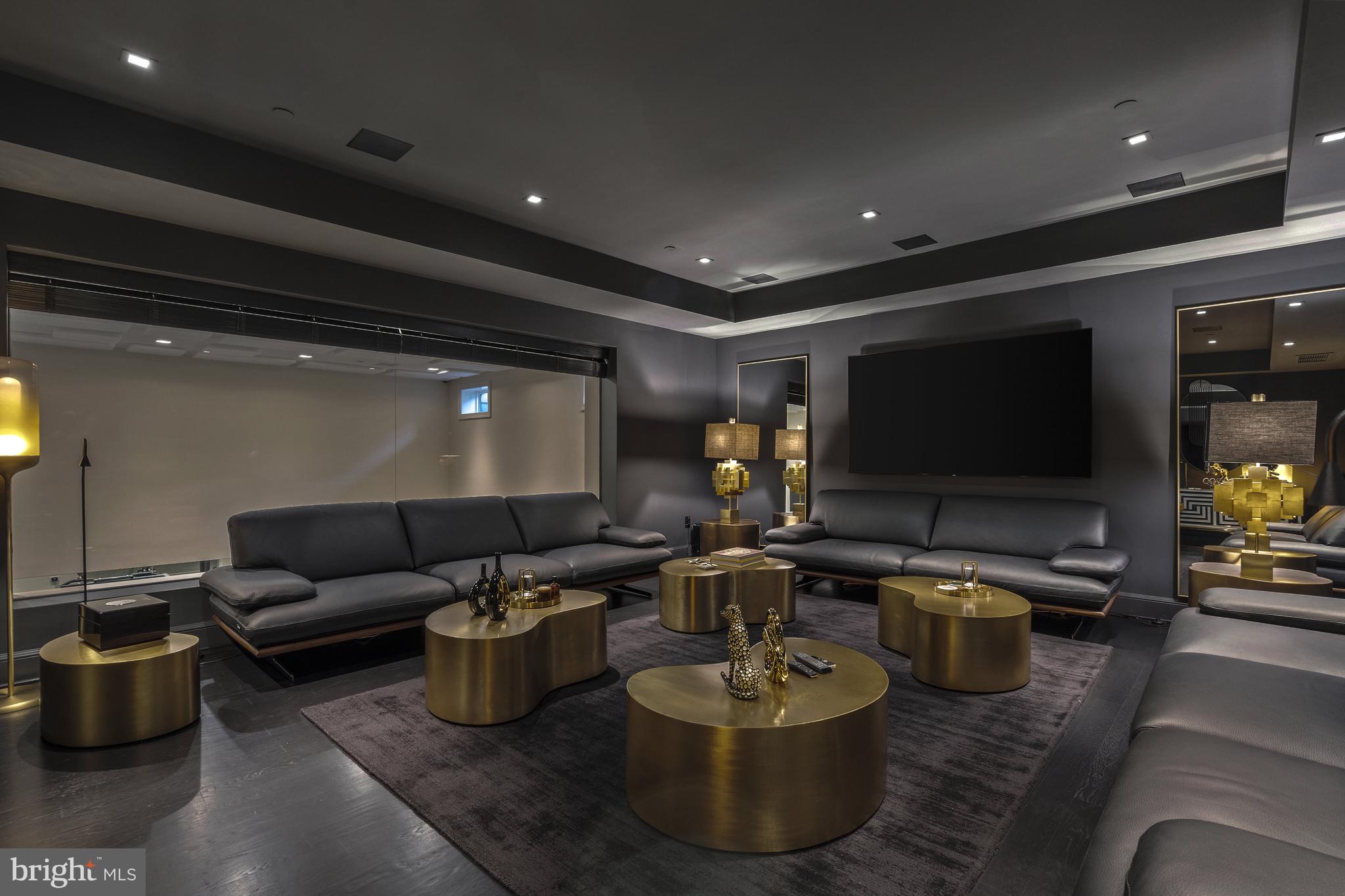 2109 Dunmore Lane Washington, DC 20007 - Photo 67 of 92 a living room with furniture and a flat screen tv