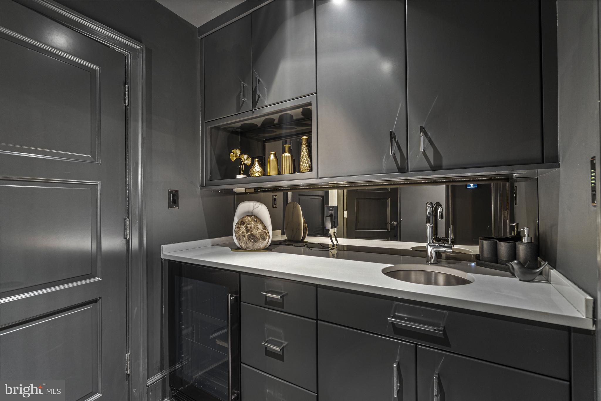 2109 Dunmore Lane Washington, DC 20007 - Photo 70 of 92 a kitchen with a sink and a refrigerator