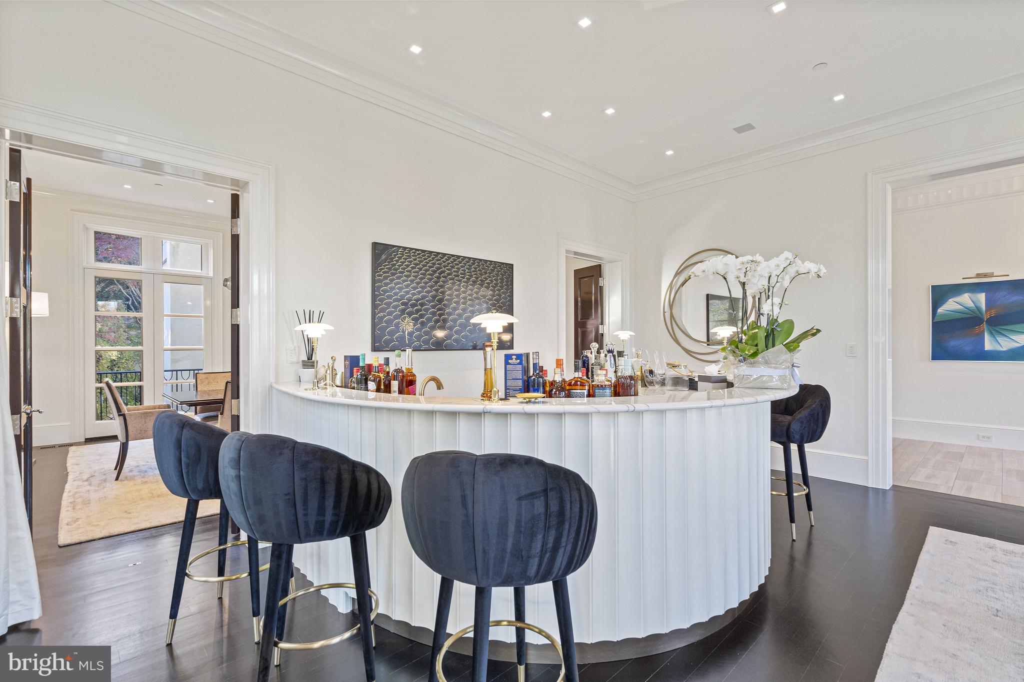 2109 Dunmore Lane Washington, DC 20007 - Photo 10 of 92 a kitchen with a dining table and chairs