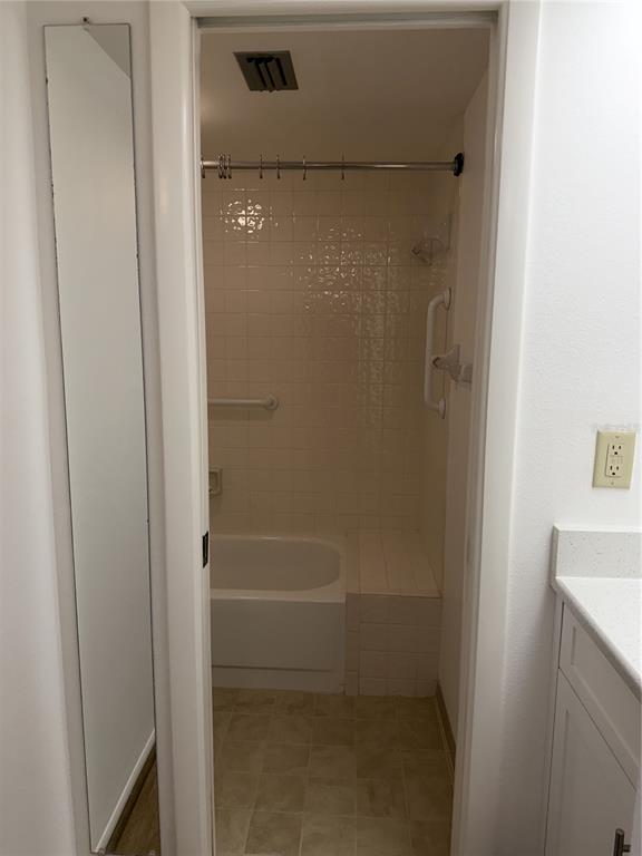 2004 Longpointe Circle Venice, FL 34293 - Photo 44 of 54 a bathroom with a glass shower door