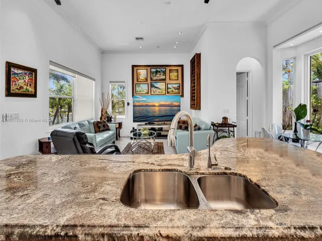 a kitchen with a sink counter top space and appliances