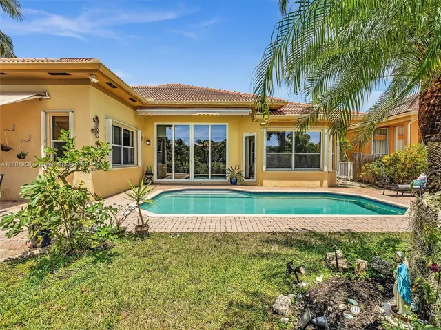 a view of road with large trees