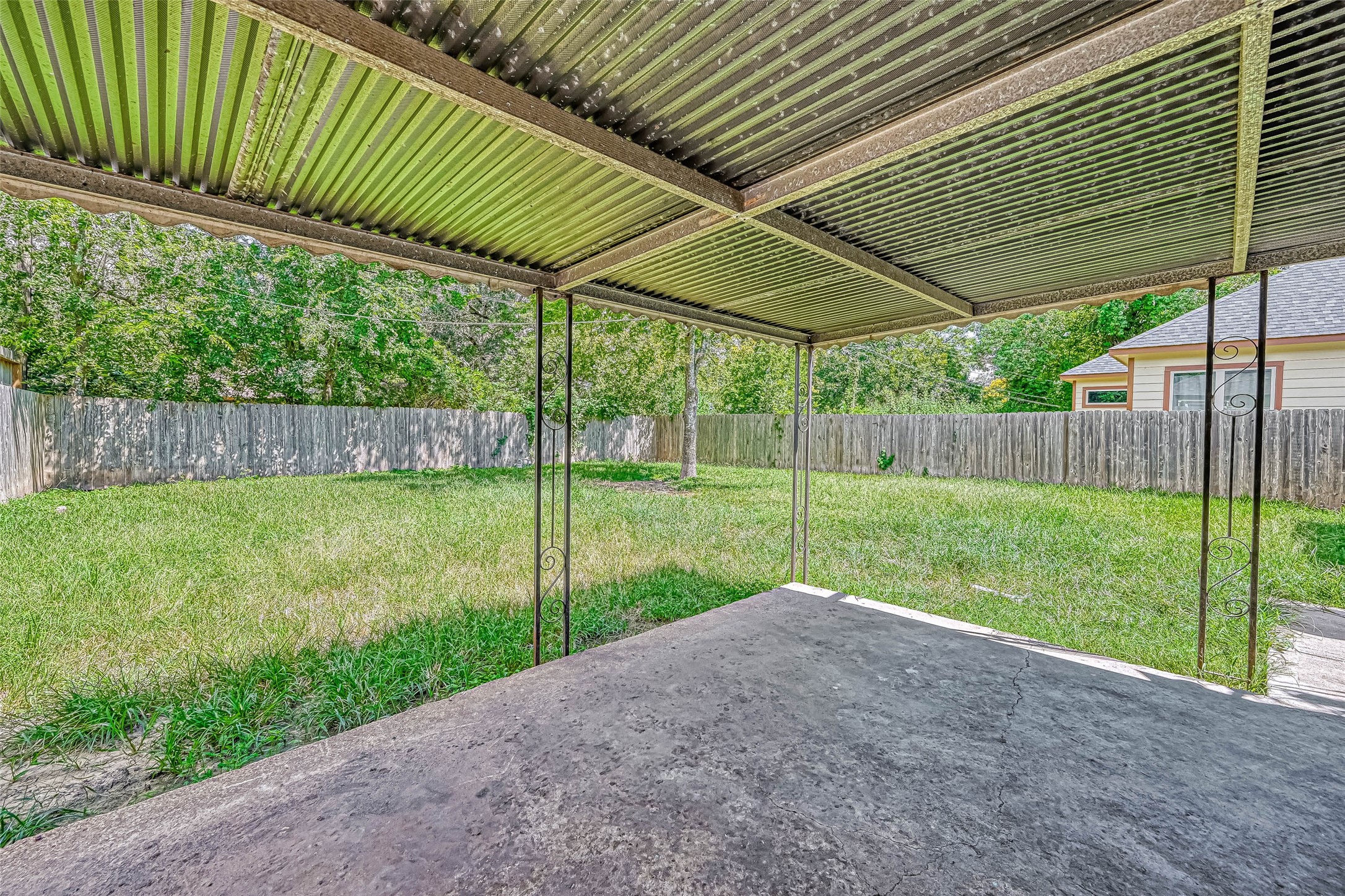 4821 Alvin Street Houston, TX 77033 - Photo 13 of 15 a view of a backyard with a garden