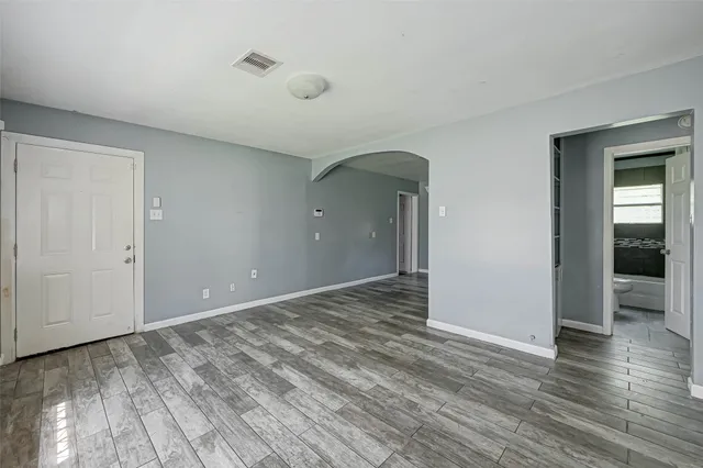 a view of an empty room and window