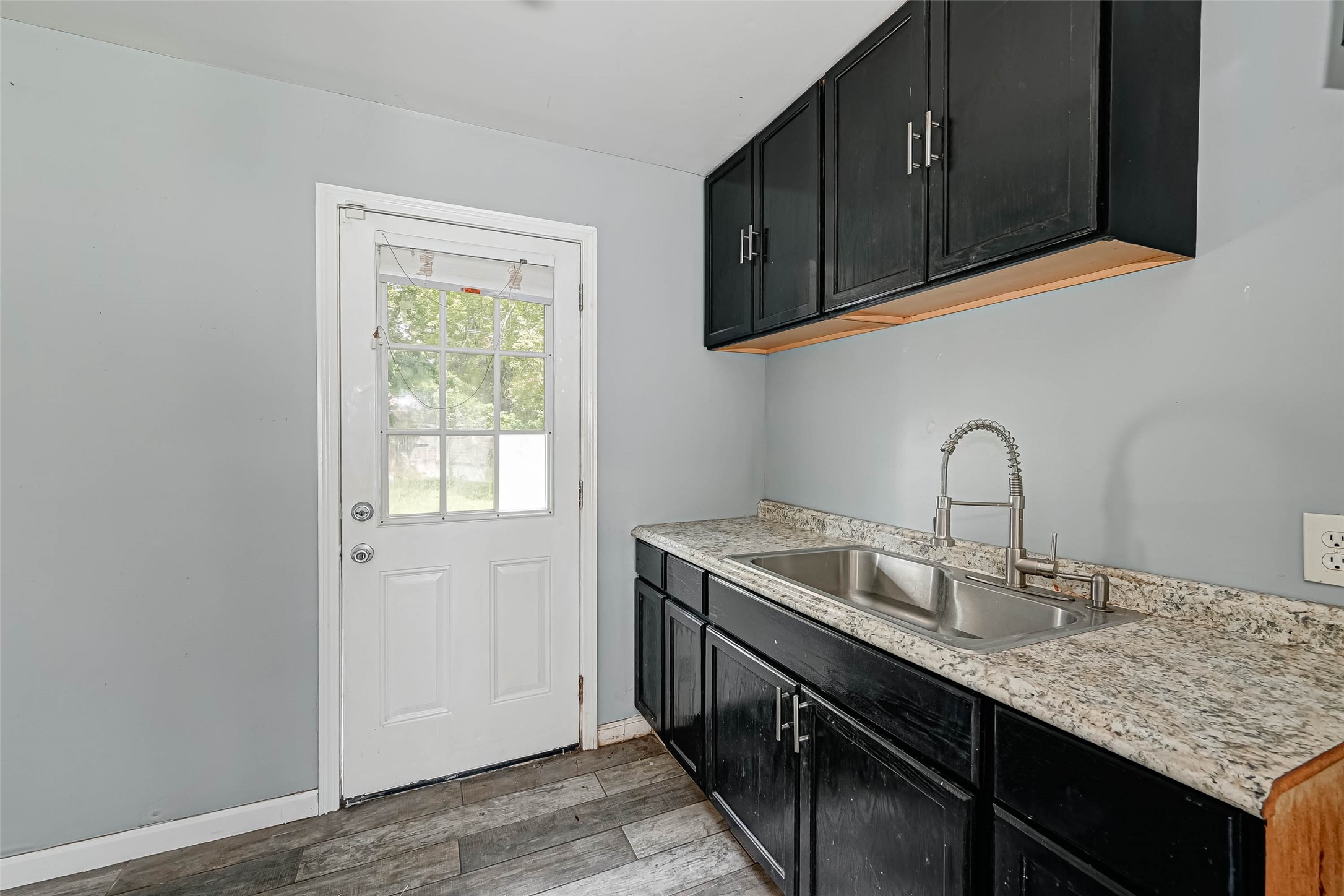 4821 Alvin Street Houston, TX 77033 - Photo 5 of 15 a close view of sink and cabinets