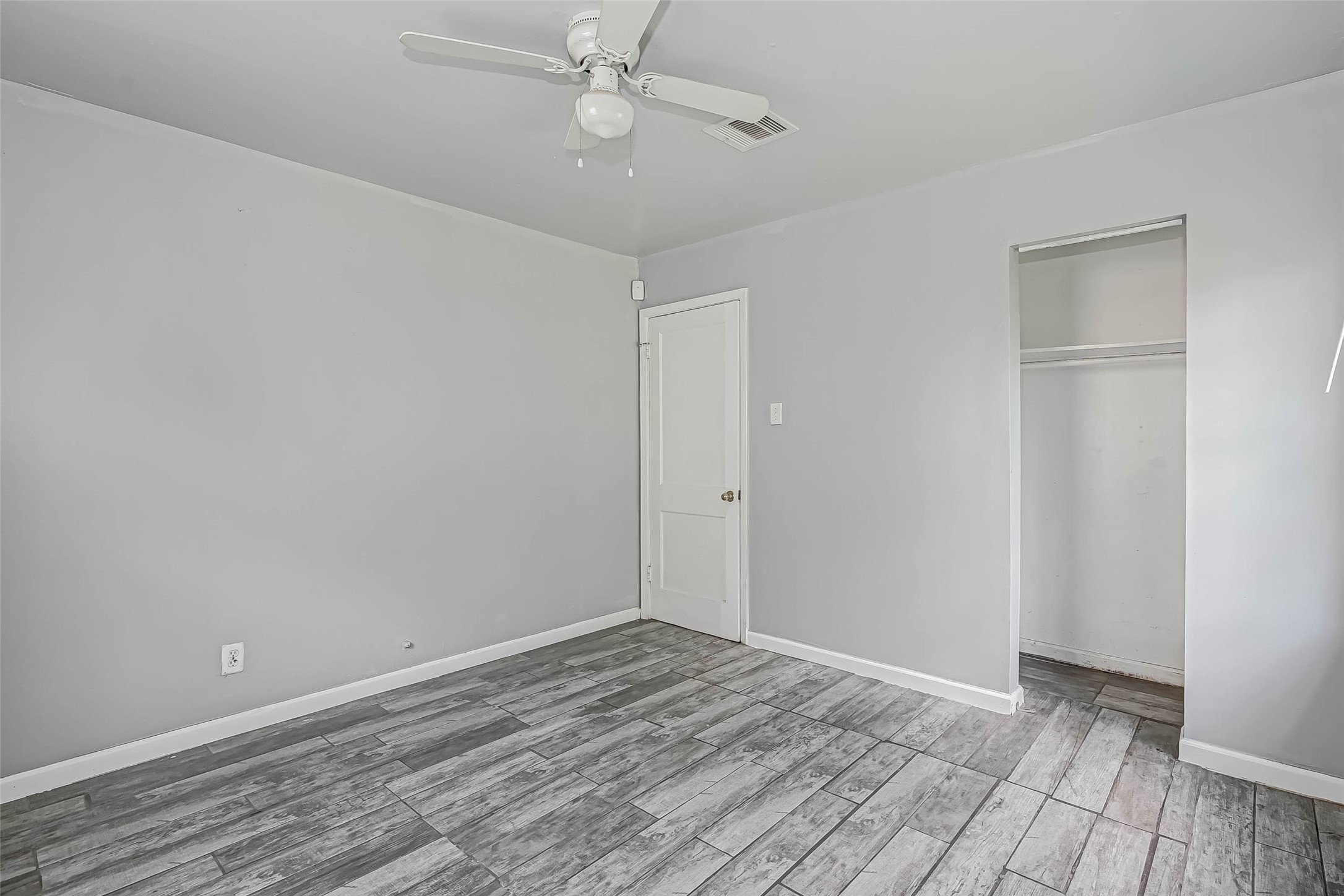 4821 Alvin Street Houston, TX 77033 - Photo 10 of 15 wooden floor in an empty room