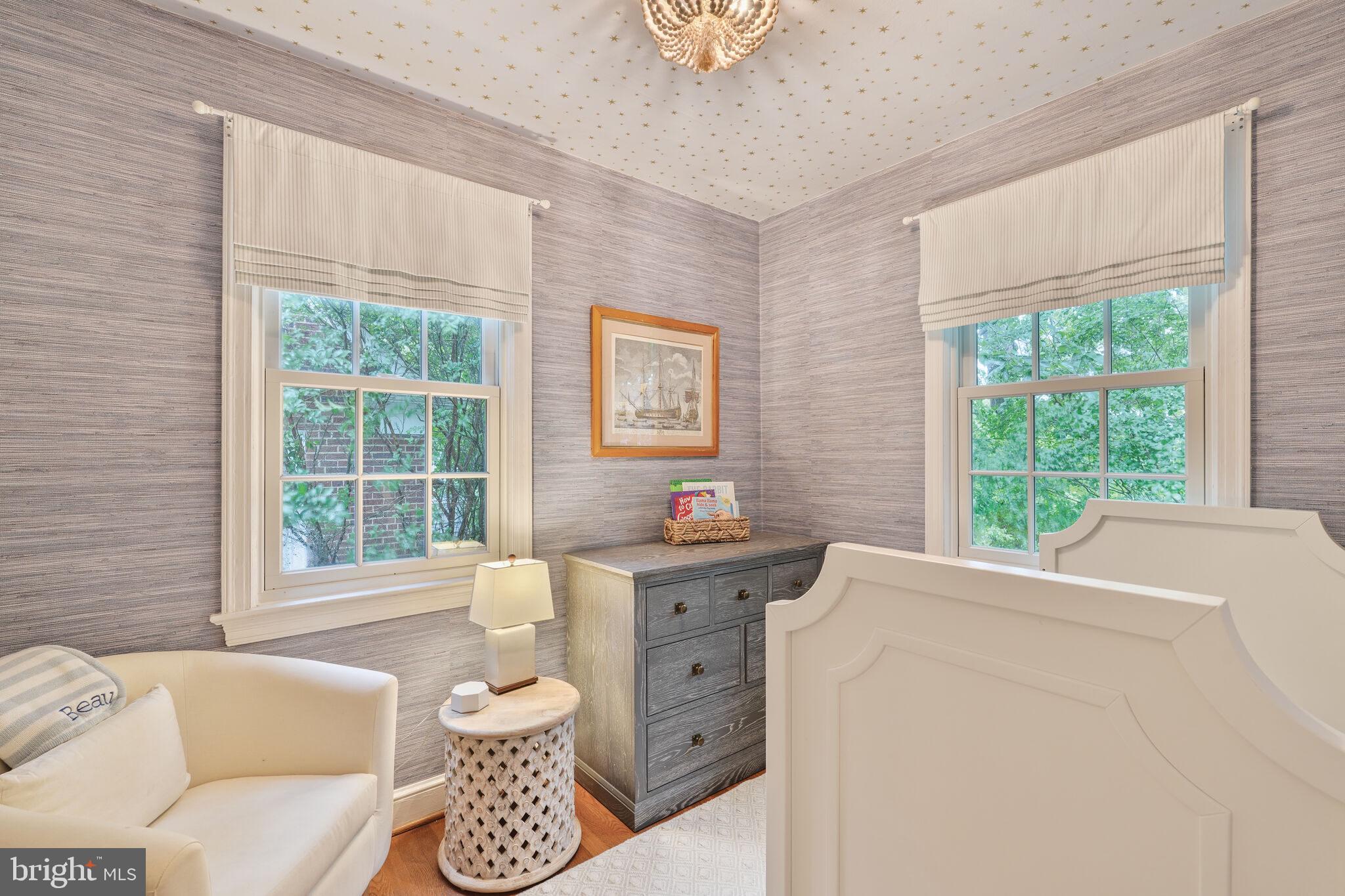 5442 Broad Branch Road Northwest Washington, DC 20015 - Photo 18 of 28 a living room with furniture and a large window