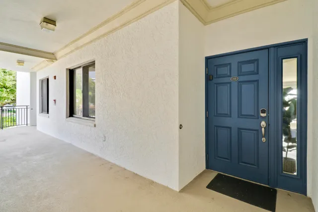 a front view of a building with garden