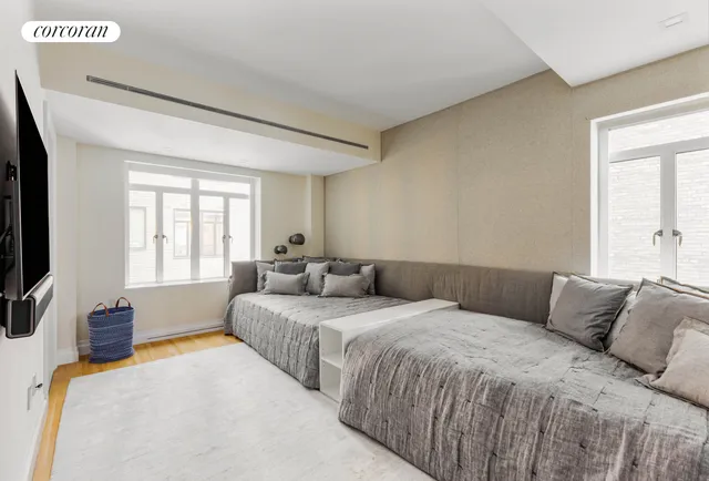 a bathroom with a double vanity sink a mirror and shower