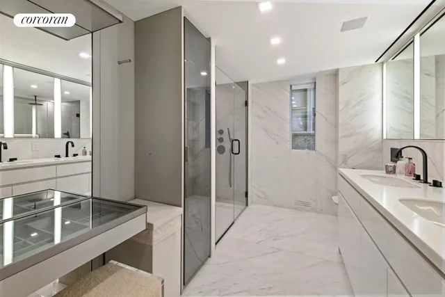 a bedroom with a bed and a table