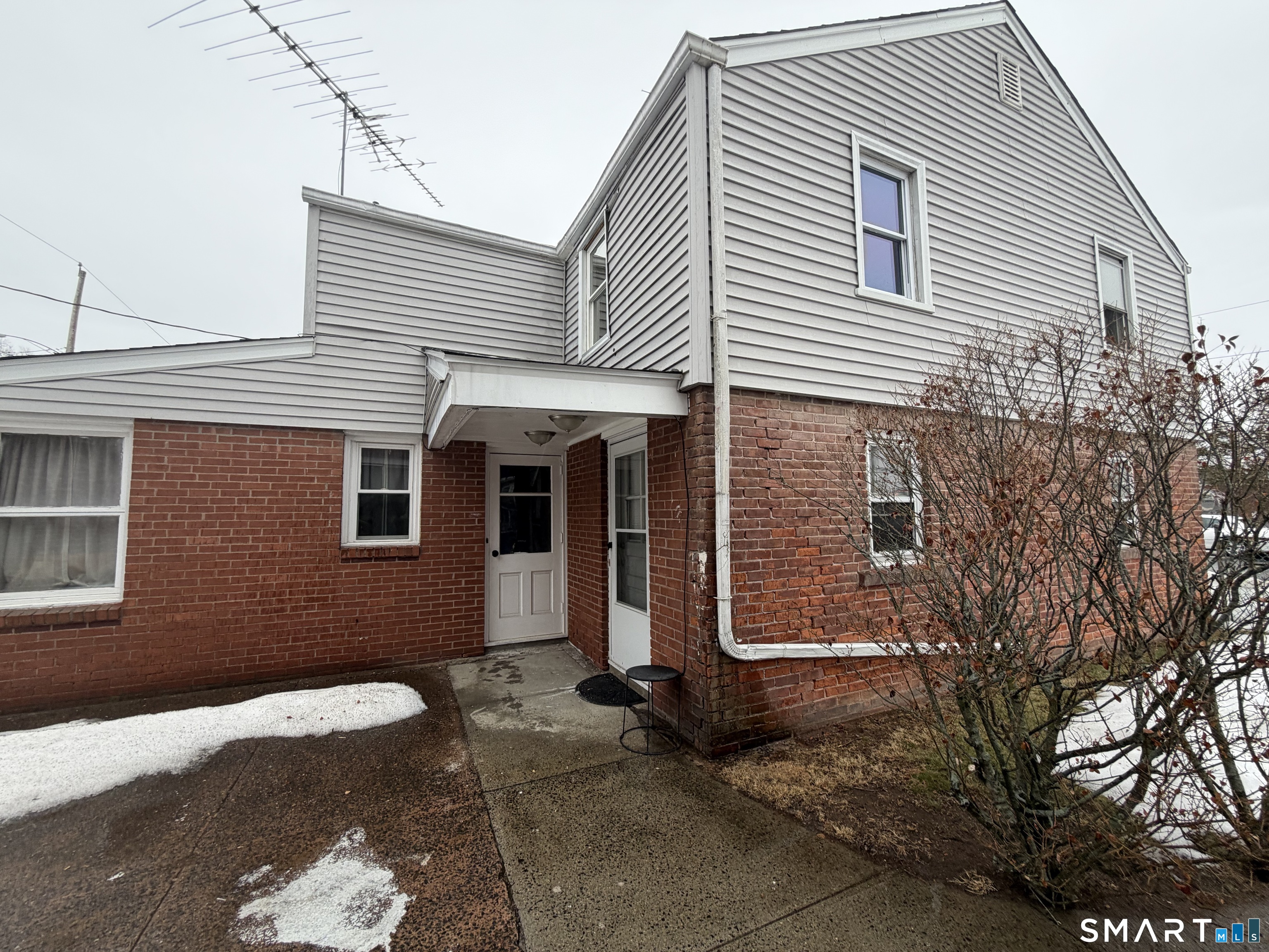 205 London Drive Hamden, CT 06517 - Photo 1 of 1 a view of a house with a yard