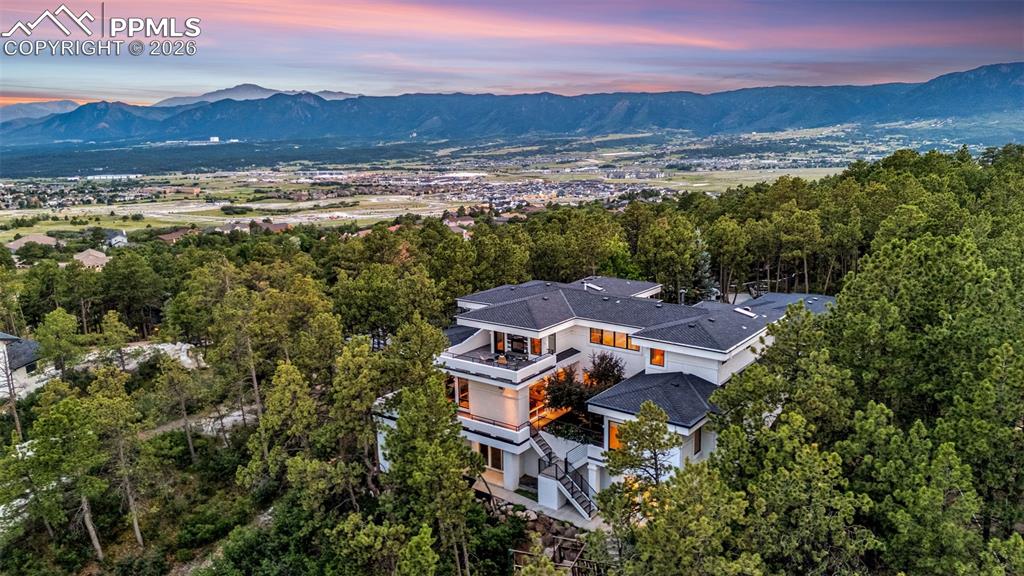 205 Cobblestone Way Monument, CO 80132 - Photo 41 of 45 an aerial view of a house with mountain view